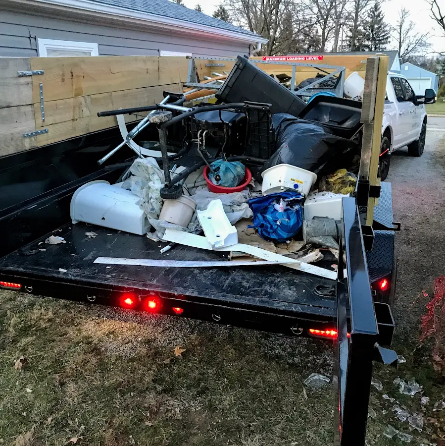 Roll-off dumpster delivered to a residential driveway in Council Bluffs