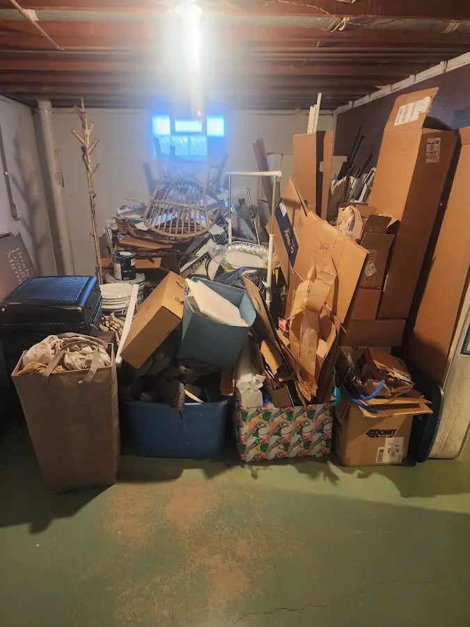 Roll-off dumpster container at job site for Cleanout Dumpster Rental in Council Bluffs